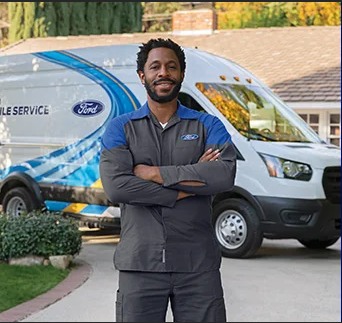 A service technician ready to service your vehicle with Ford Mobile Service in Bloomington, MN