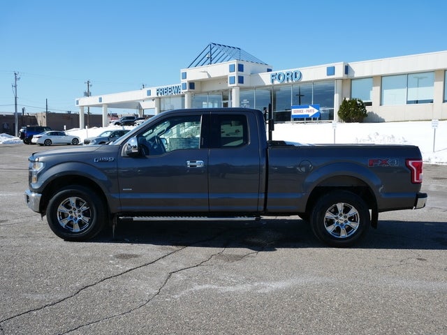 Used 2015 Ford F-150 Lariat with VIN 1FTEX1EP0FKE00098 for sale in Minneapolis, Minnesota