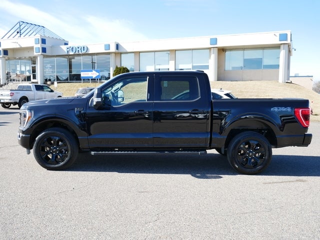 Used 2022 Ford F-150 XLT with VIN 1FTFW1E88NFB37169 for sale in Minneapolis, Minnesota