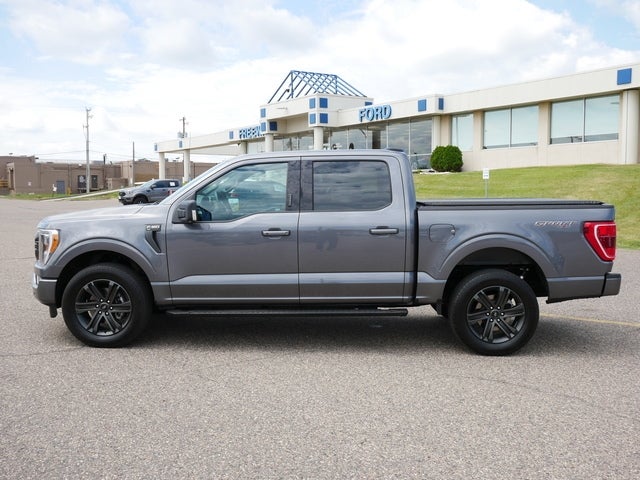 Used 2021 Ford F-150 XLT with VIN 1FTFW1E8XMFA33426 for sale in Minneapolis, Minnesota