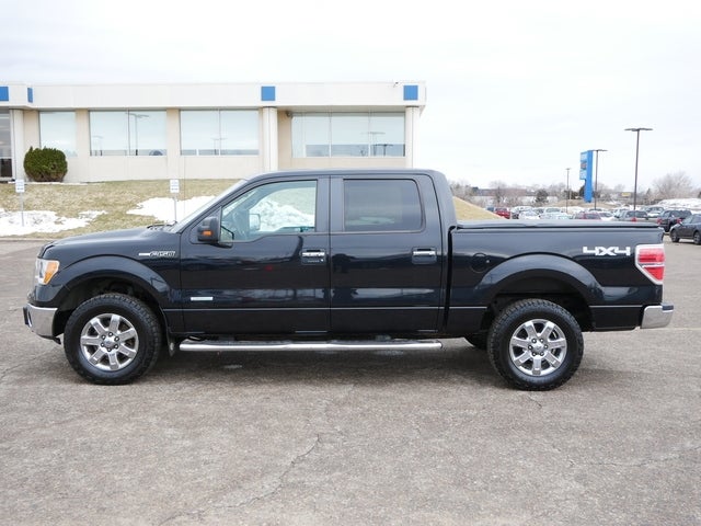 Used 2014 Ford F-150 XLT with VIN 1FTFW1ETXEFC94867 for sale in Minneapolis, Minnesota