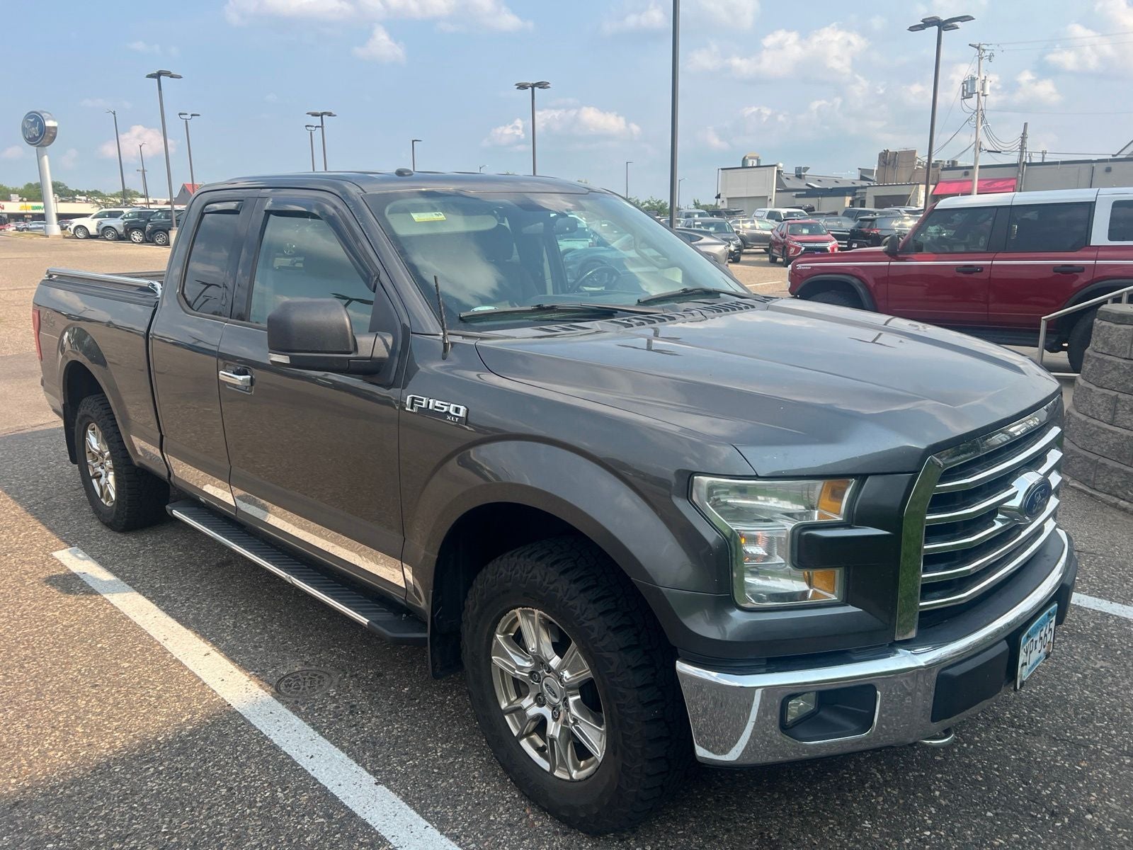Used 2015 Ford F-150 XLT with VIN 1FTFX1EF2FKE87109 for sale in Minneapolis, Minnesota