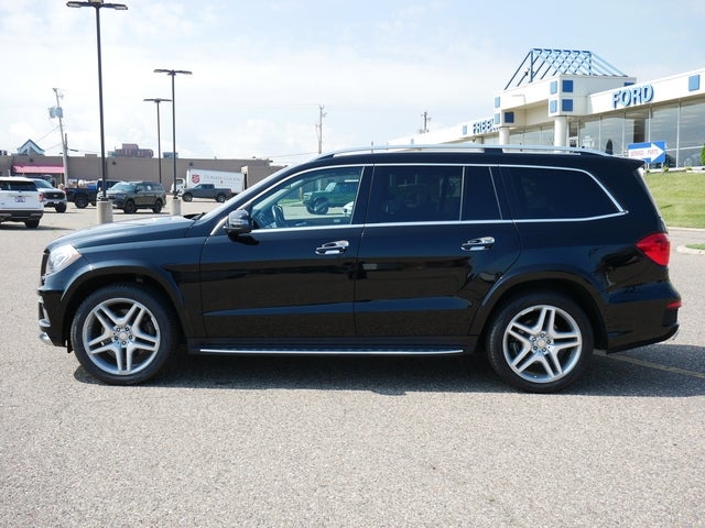 Used 2015 Mercedes-Benz GL-Class GL550 with VIN 4JGDF7DE1FA531320 for sale in Minneapolis, Minnesota